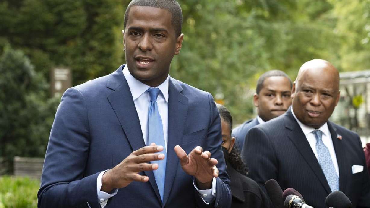 Bakari Sellers, the attorney for the families of victims killed in the 2015 Mother Emanuel AME Church massacre, speaks with reporters outside the Justice Department, in Washington on Thursday. Families of nine victims killed in a racist attack at the Black South Carolina church have reached a settlement with the Justice Department over a faulty background check that allowed Dylann Roof to purchase the gun he used in the massacre.