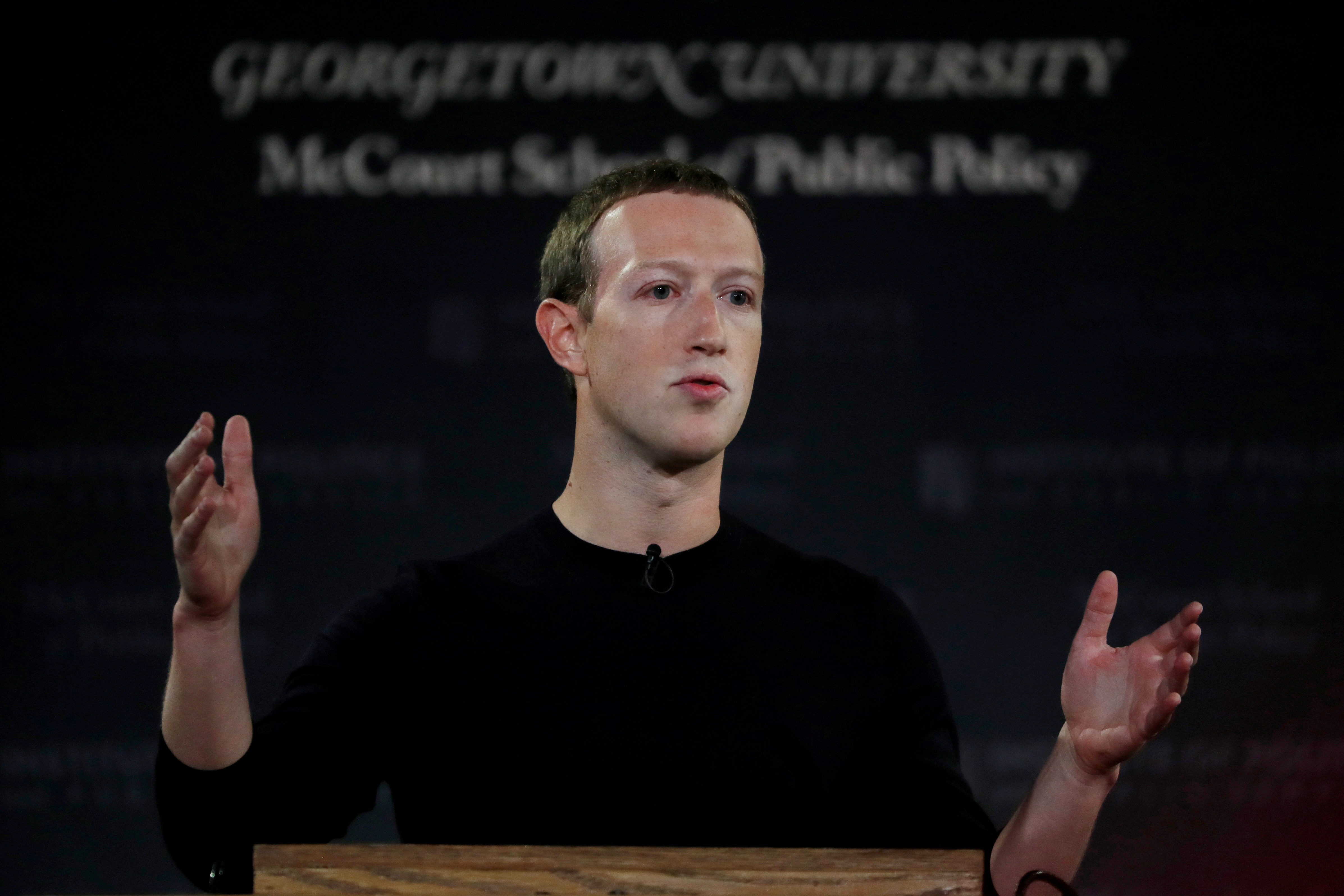 Facebook Chairman and CEO Mark Zuckerberg addresses the audience on the challenges of protecting free speech at a forum hosted by Georgetown University's Institute of Politics and Public Service and the McCourt School of Public Policy in Washington, Oct. 17, 2019.