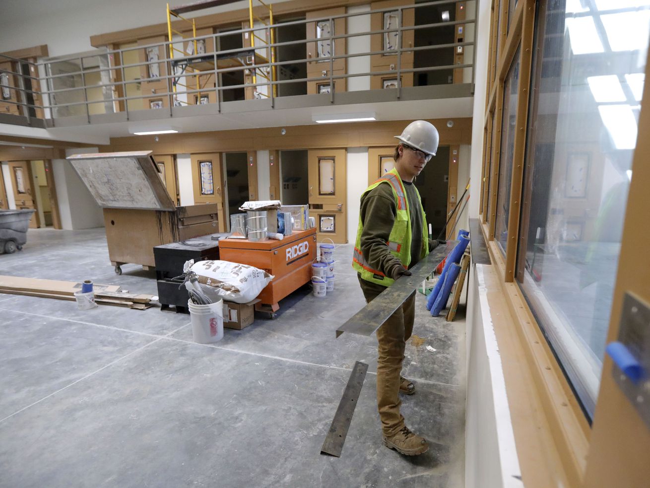 Dallas Tucker, Ezarc Building Solutions laborer, works in the receiving and orientation building at the new Utah State Prison in Salt Lake City on Oct. 21.