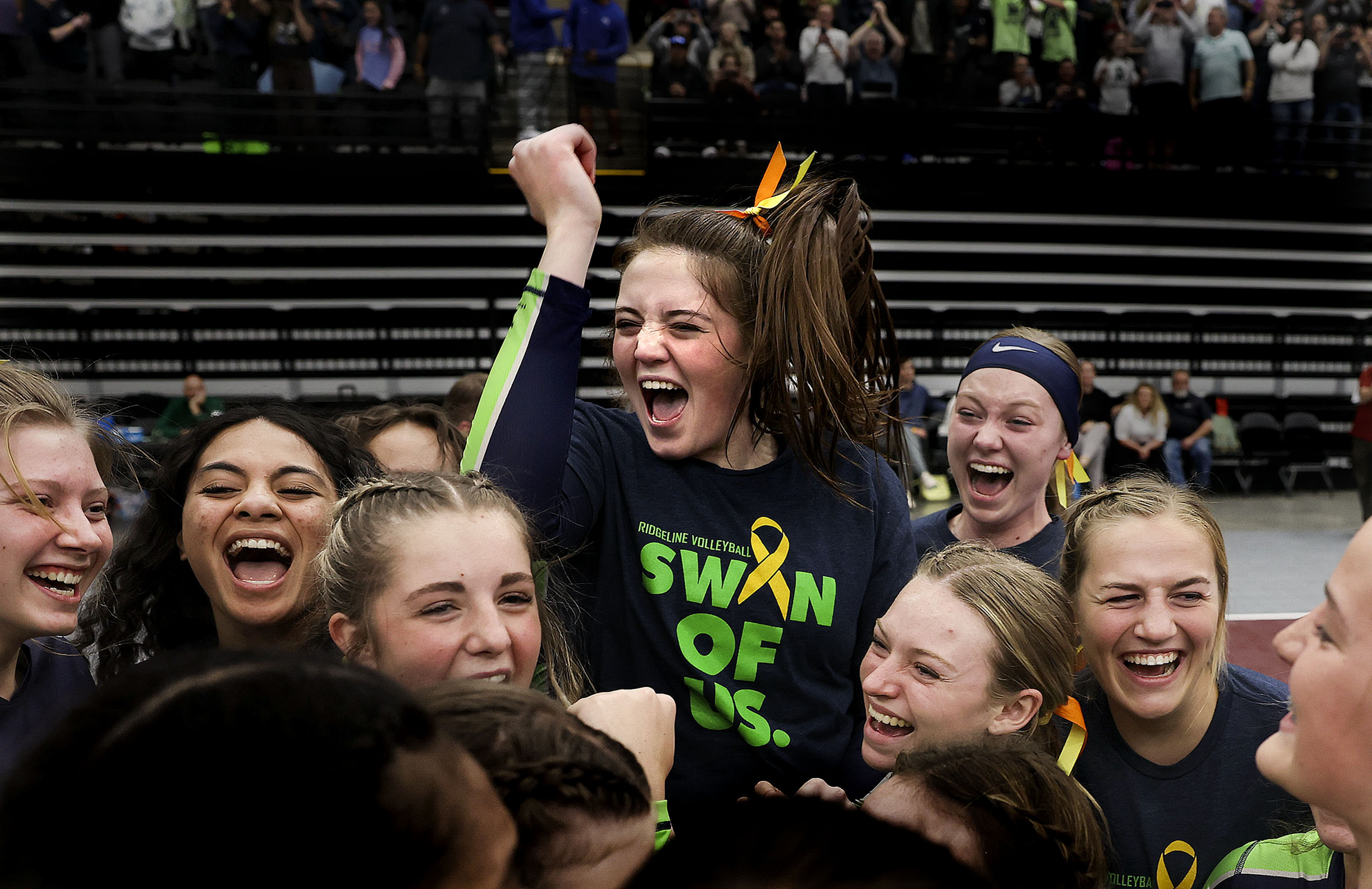 Ridgeline celebrates their 4A volleyball state championship win against Desert Hills at Utah Valley University in Orem on Thursday, Oct. 28, 2021.