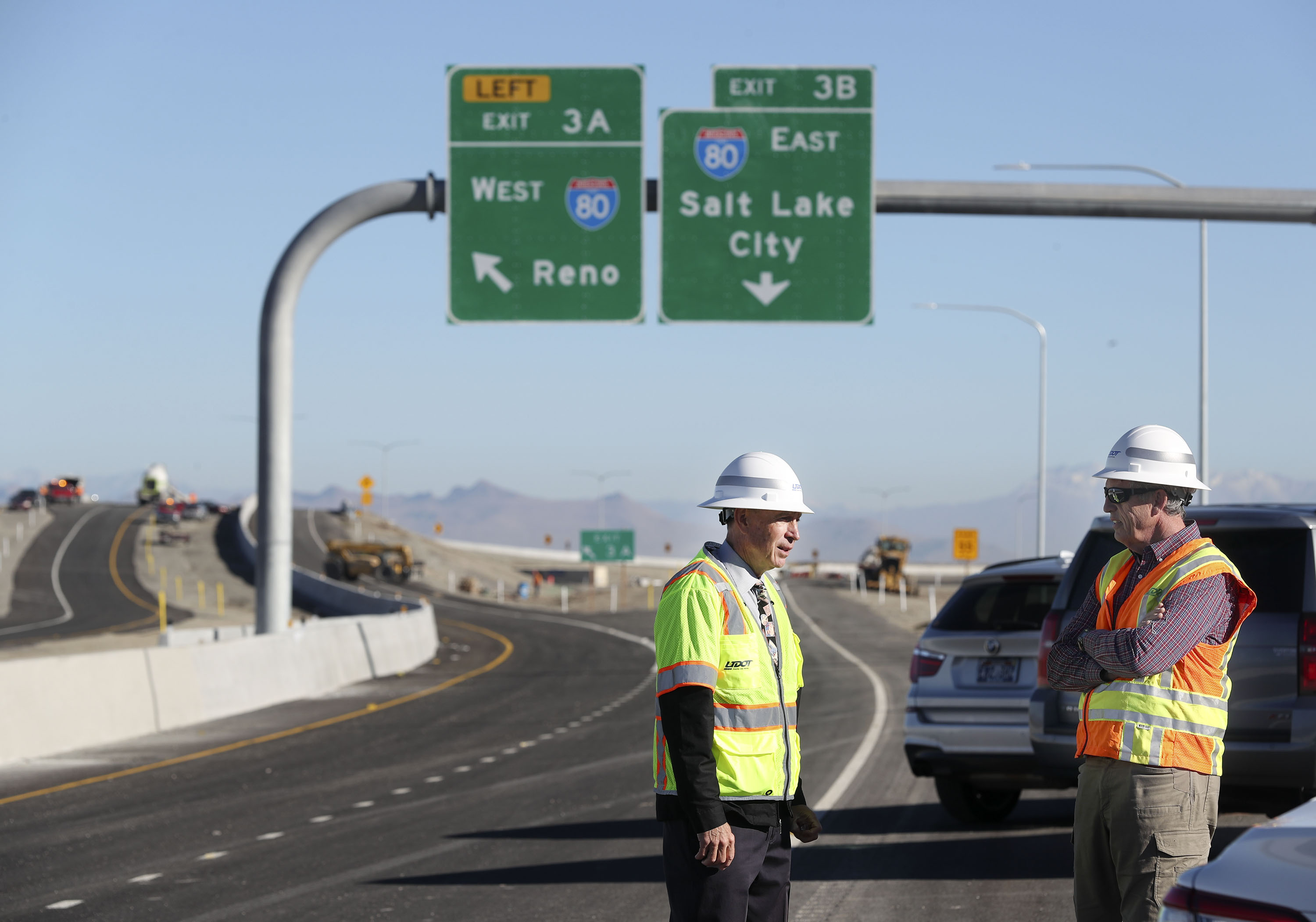 Rep. Merrill Nelson, R-Grantsville, and Tom Tripp, Tooele County council member, speak at the opening of the new Midvalley Highway (state Route 179), a highway that will provide Tooele County drivers with better access to I-80, alleviating congestion at the S.R. 36 interchange and along S.R. 36, in Tooele on Friday.