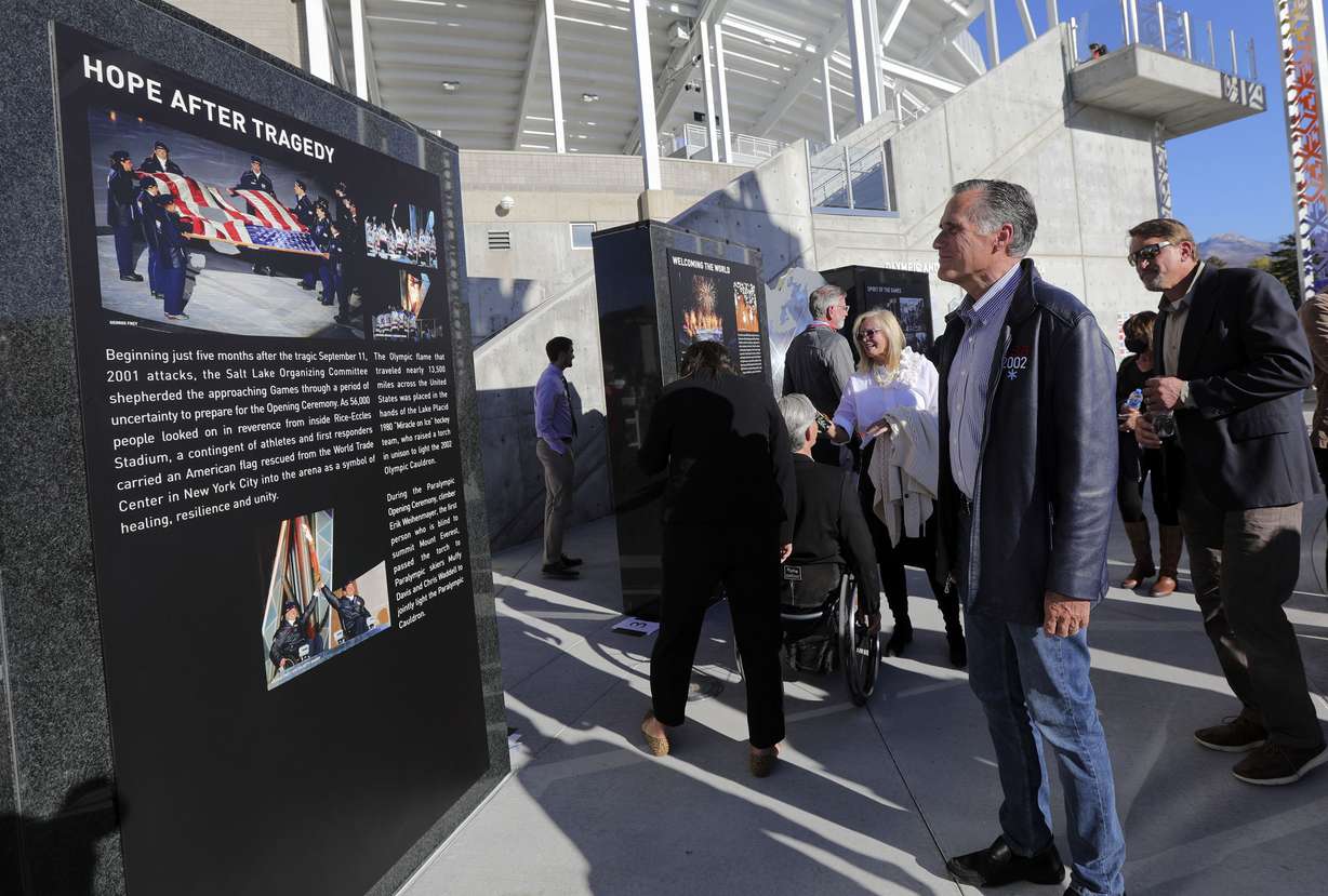 Sen. Mitt Romney explores the University of Utah 2002 Olympic and Paralympic Cauldron Plaza during an unveiling ceremony at Rice-Eccles Stadium in Salt Lake City on Friday.