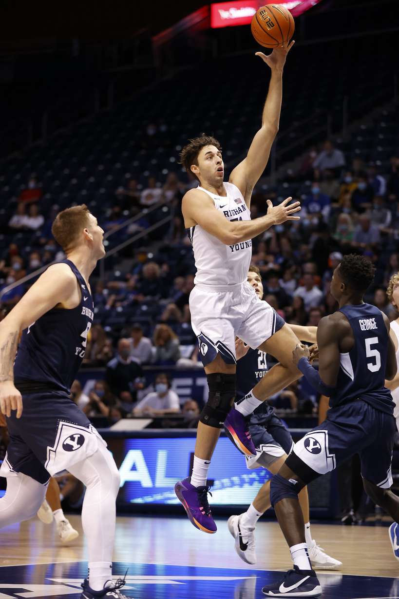 BYU forward Gavin Baxter drives to the rim during the Cougars' annual Blue-White game, Friday, Oct. 29, 2021 in Provo.