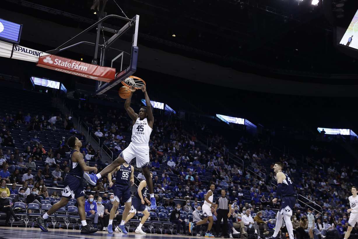 BYU forward Fousseyni Traore dunks with authority during the Cougars' annual Blue-White game, Friday, Oct. 29, 2021 in Provo.