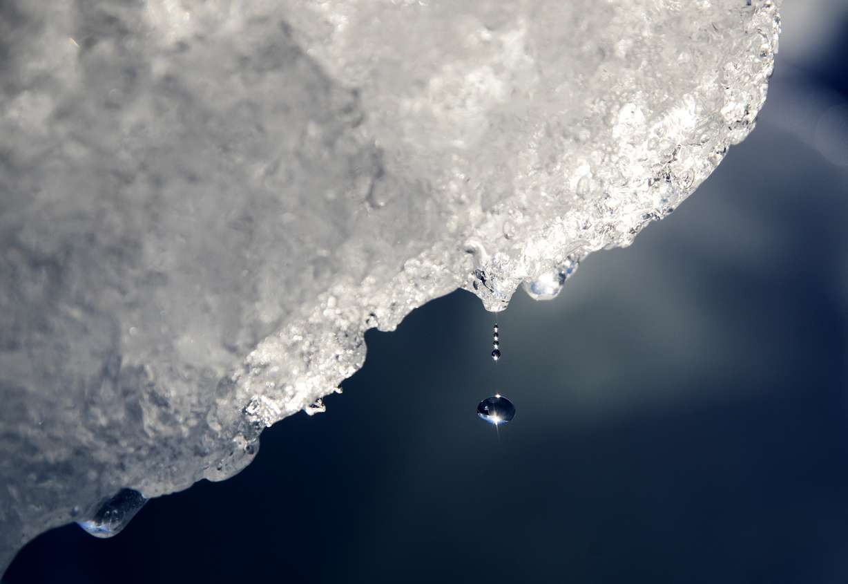 A drop of water falls off an iceberg melting in the Nuup Kangerlua Fjord near Nuuk in southwestern Greenland. World leaders have been trying to do something about climate change for 29 years but in that time Earth has gotten much hotter and more dangerous.