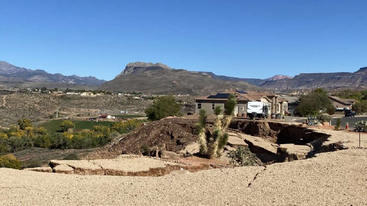 Landscaping and plant life are the last signs of two homes that were lost to an ongoing landslide in La Verkin, Washington County, on Wednesday.
