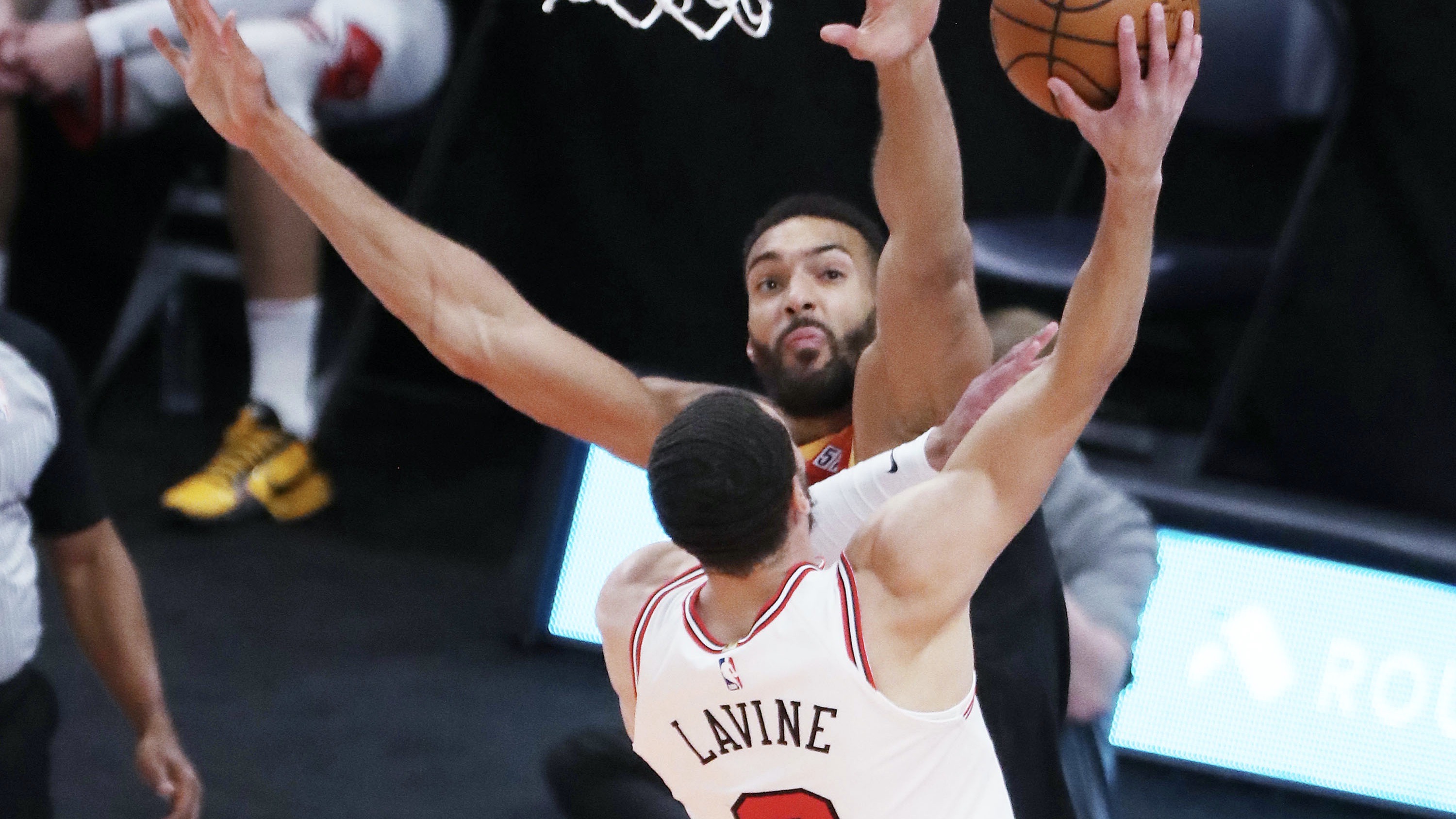 Utah Jazz center Rudy Gobert (27) defends against Chicago Bulls guard Zach LaVine (8)