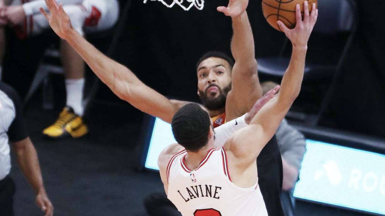 Utah Jazz center Rudy Gobert (27) defends against Chicago Bulls guard Zach LaVine (8)