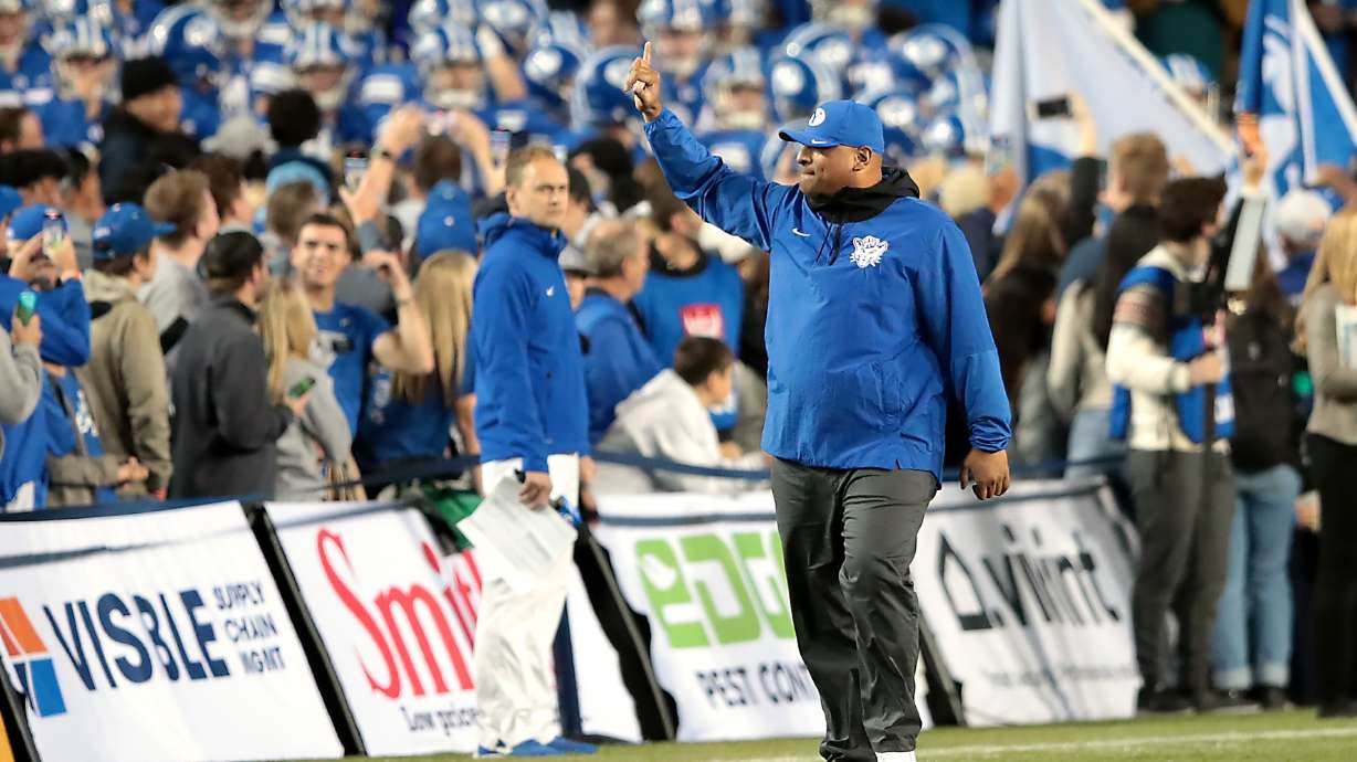 Brigham Young Cougars head coach Kalani Sitake gives the fans a shaka prior to BYU and Virginia playing at LaVell Edwards stadium in Provo on Saturday, Oct. 30, 2021.