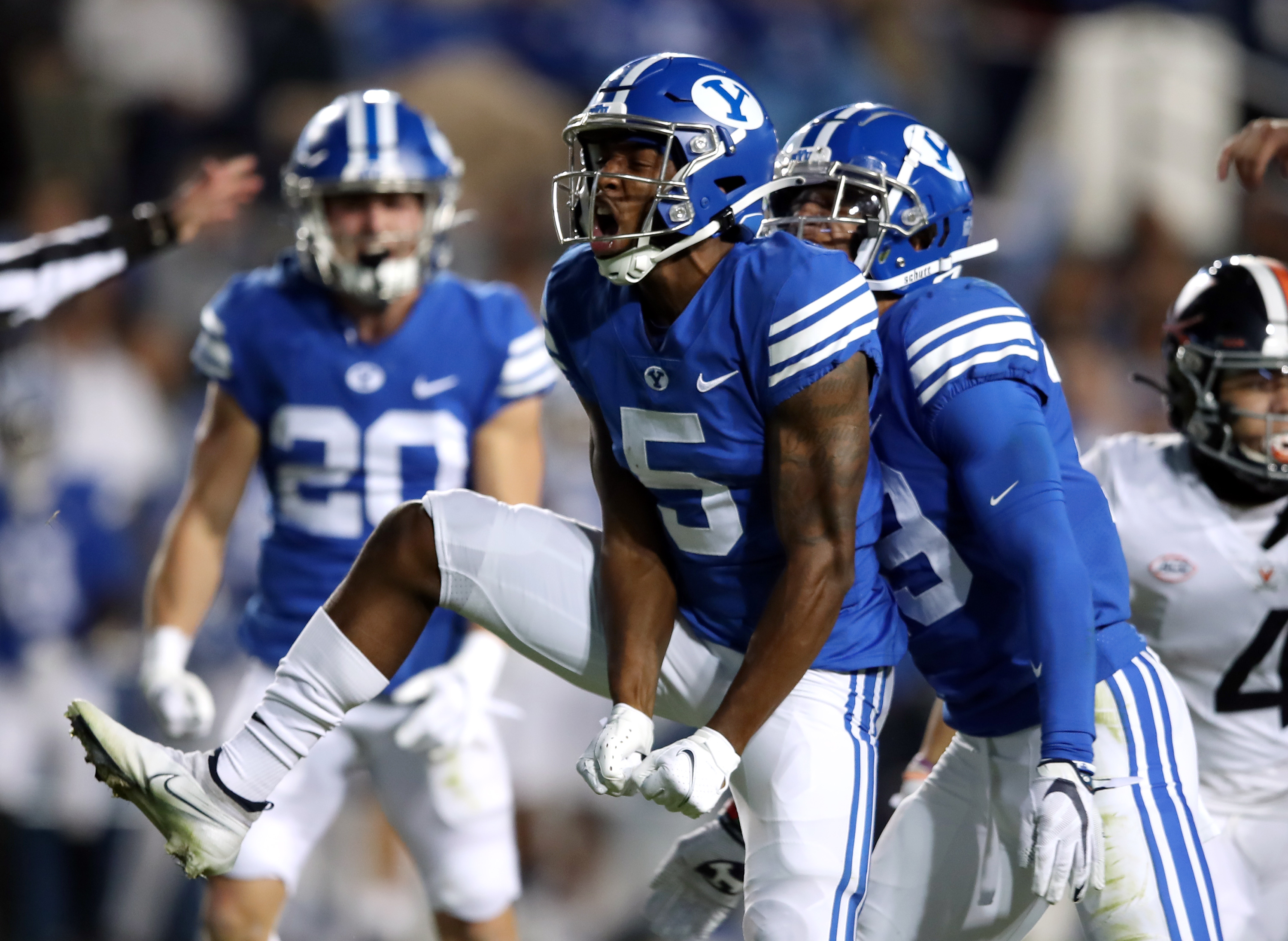 Brigham Young Cougars wide receiver Chris Jackson (5) celebrates after a tackle, but was flagged for targeting and disqualified from the game as BYU and Virginia prepare to play at LaVell Edwards stadium in Provo on Saturday, Oct. 30, 2021.