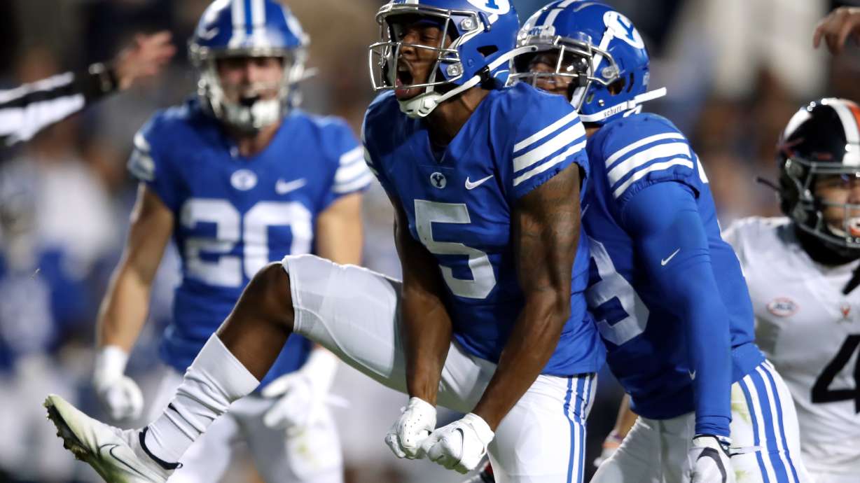 Brigham Young Cougars wide receiver Chris Jackson (5) celebrates after a tackle, but was flagged for targeting and disqualified from the game as BYU and Virginia prepare to play at LaVell Edwards stadium in Provo on Saturday, Oct. 30, 2021.