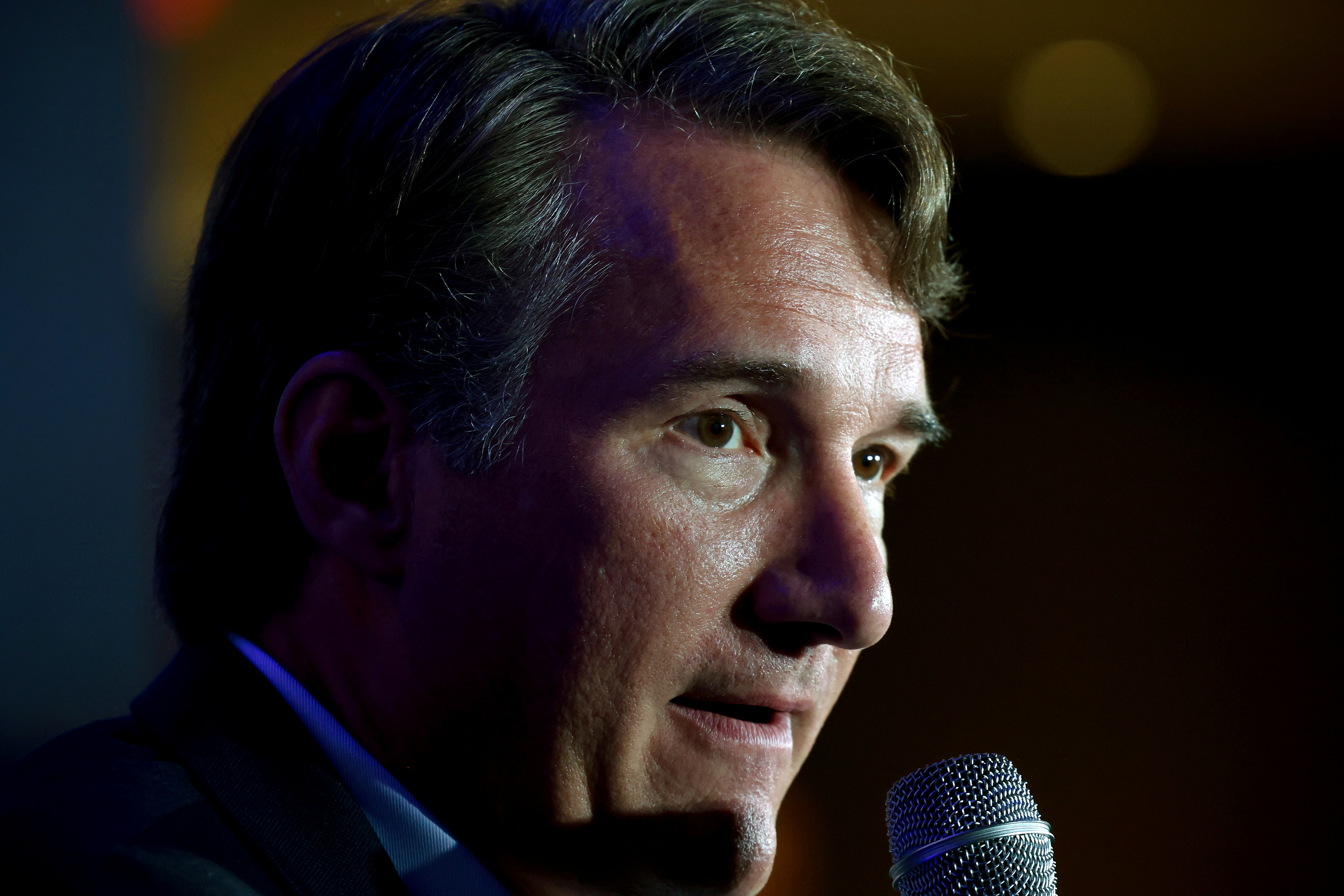 Virginia gubernatorial candidate Glenn Youngkin speaks during a campaign event in McLean, Virginia, on July 14. Youngkin is within striking distance of Democrat Terry McAuliffe in a Virginia governor's election that will test a strategy of trying to woo suburban moderates without alienating the hard-liners who backed Donald Trump.
