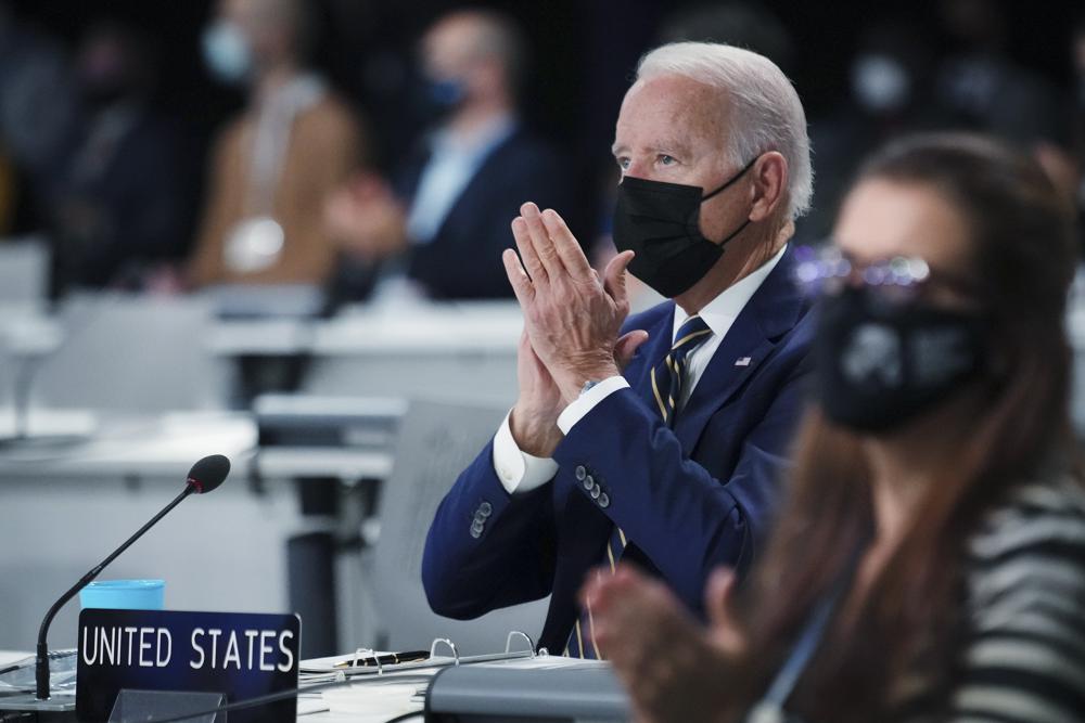 President Joe Biden attends the opening session of the COP26 U.N. Climate Summit, Monday, in Glasgow, Scotland. Biden was swinging the focus of his battle for fast, concerted action against global warming from the U.S. Congress to the world on Monday.