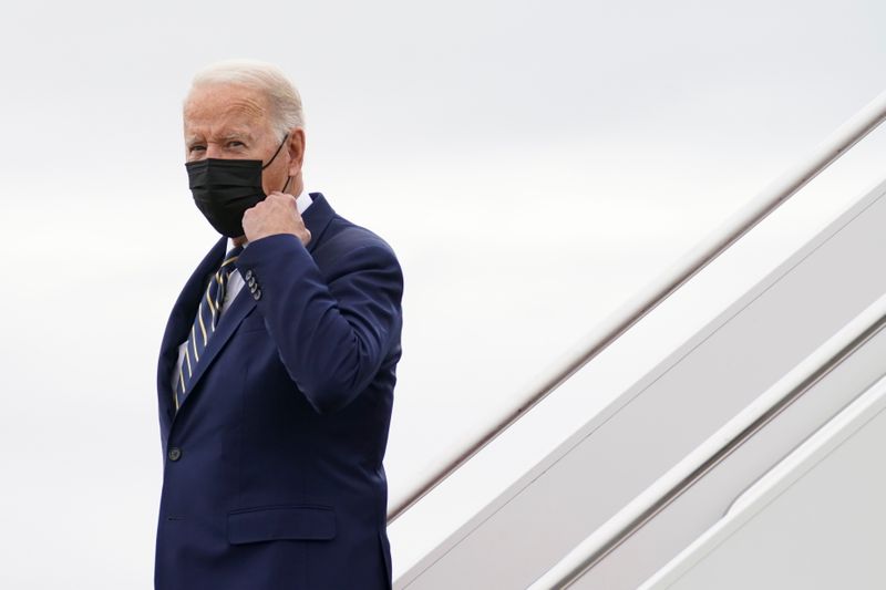President Joe Biden looks on upon arrival to attend the UN Climate Change Conference in Glasgow, at Edinburgh Airport in Edinburgh, Scotland, on November 1, 2021.