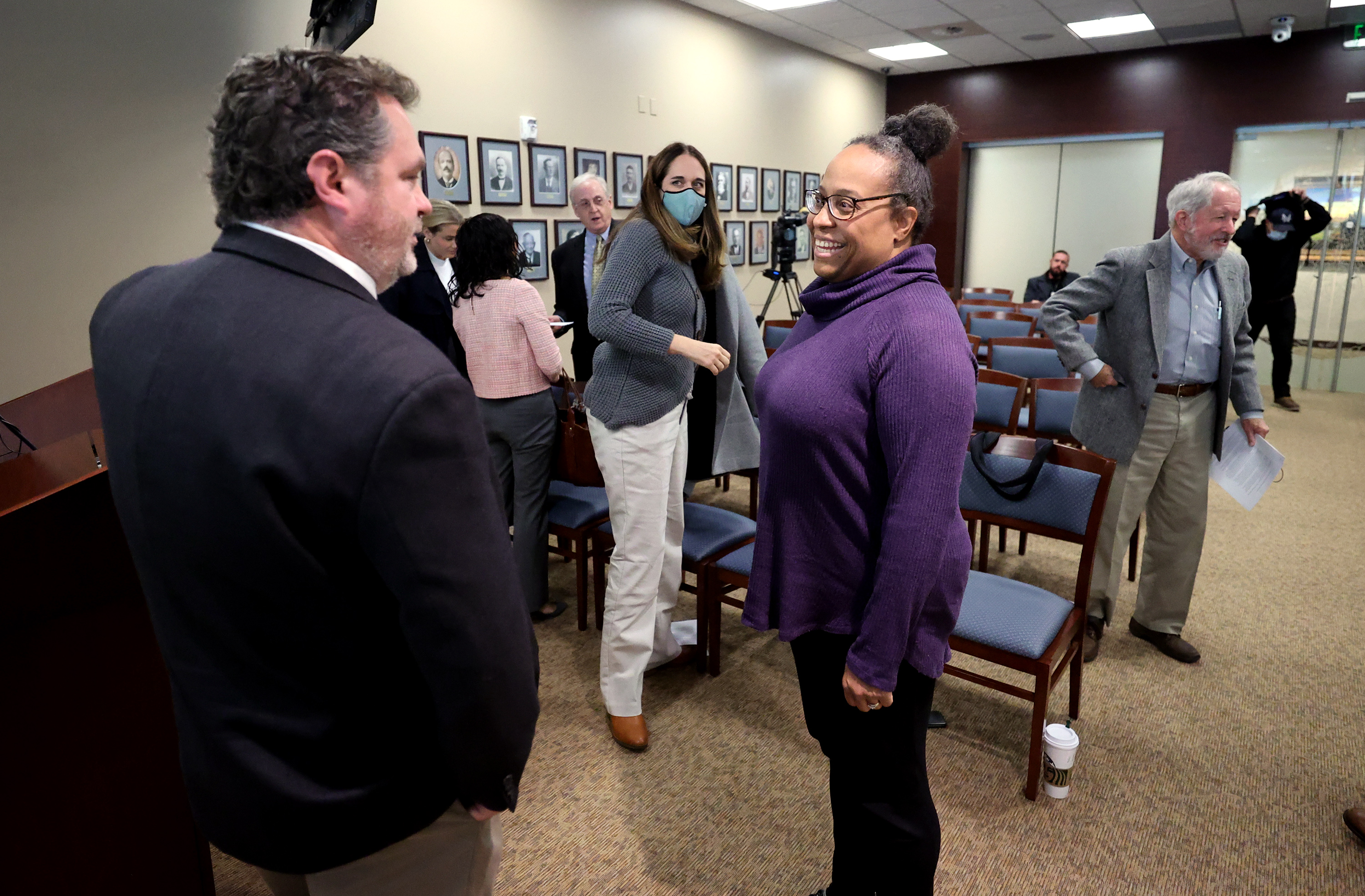 Davis County Attorney Troy Rawlings, left, talks with law professor Teneille Brown, center, and Adrienne Gillespie Andrews, assistant vice president for diversity and chief diversity officer at Weber State University after a press conference in Farmington announcing the establishment of a Conviction Integrity Unit on Monday. Brown and Andrews were named to the unit.