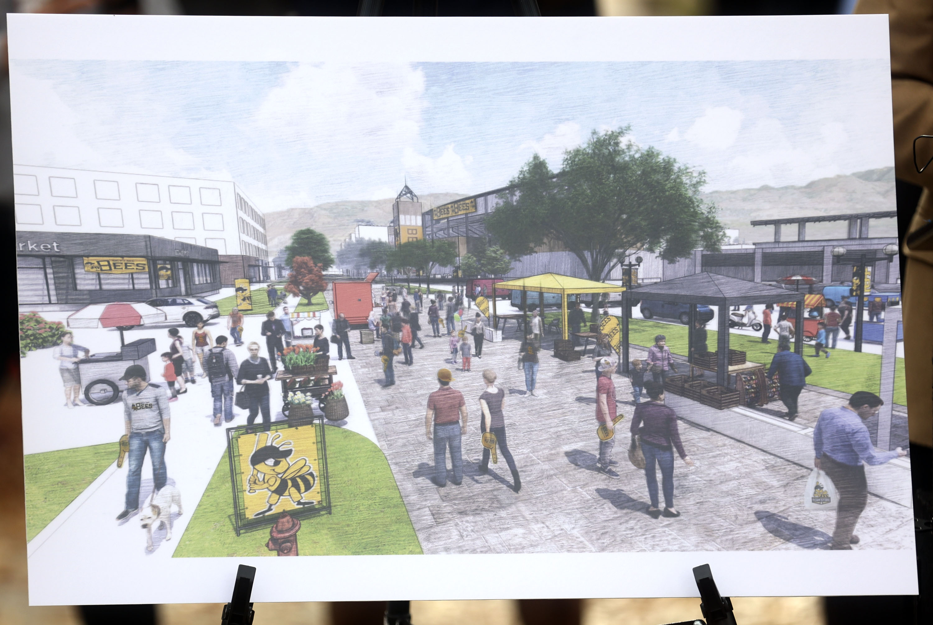 A rendition shows new plans for the Ballpark neighborhood, including a new library and street fair area, in Salt Lake City on Monday.