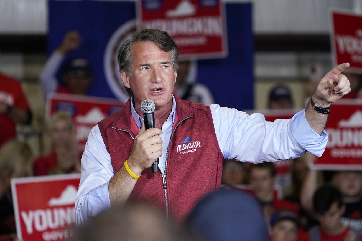 Republican gubernatorial candidate Glenn Youngkin gestures as he speaks to supporters during a rally in Chesterfield, Va., on Monday, Nov. 1, 2021. Youngkin will face Democrat former Gov. Terry McAuliffe in the November election.