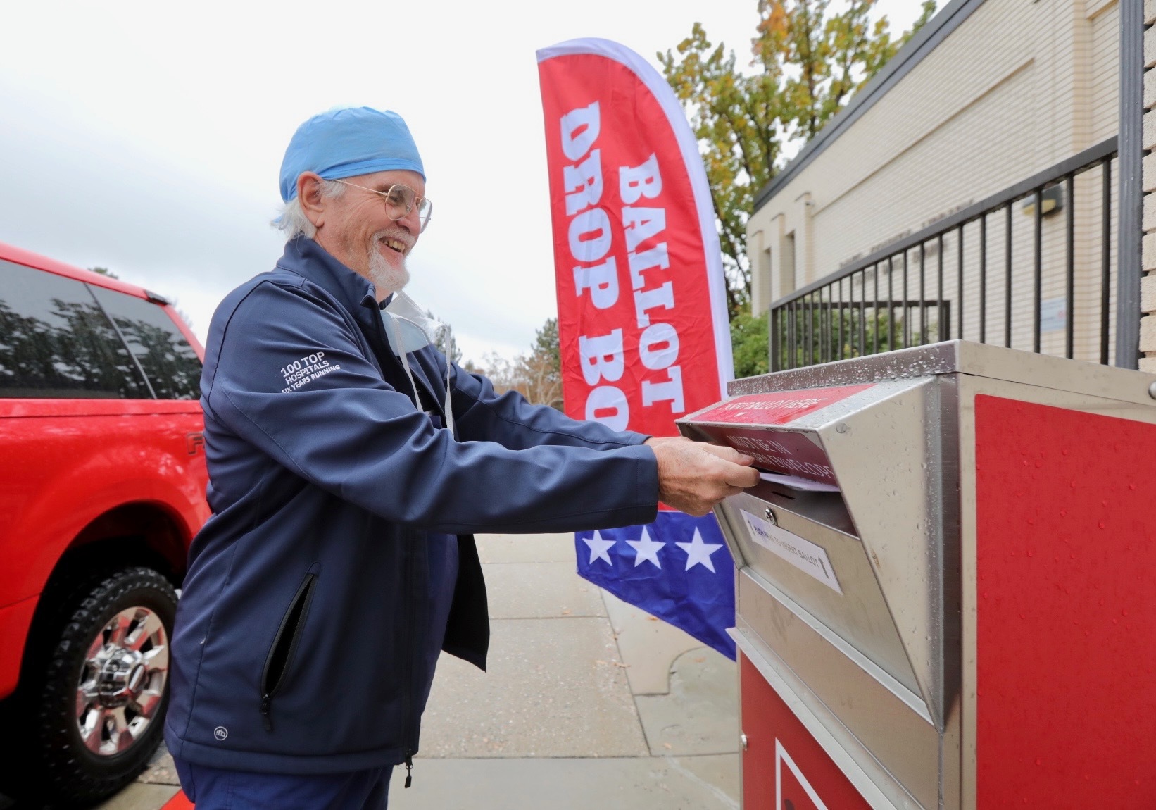 Kevin Clark of Bountiful drops off his ballot at the Davis County Library South Branch, Tuesday.