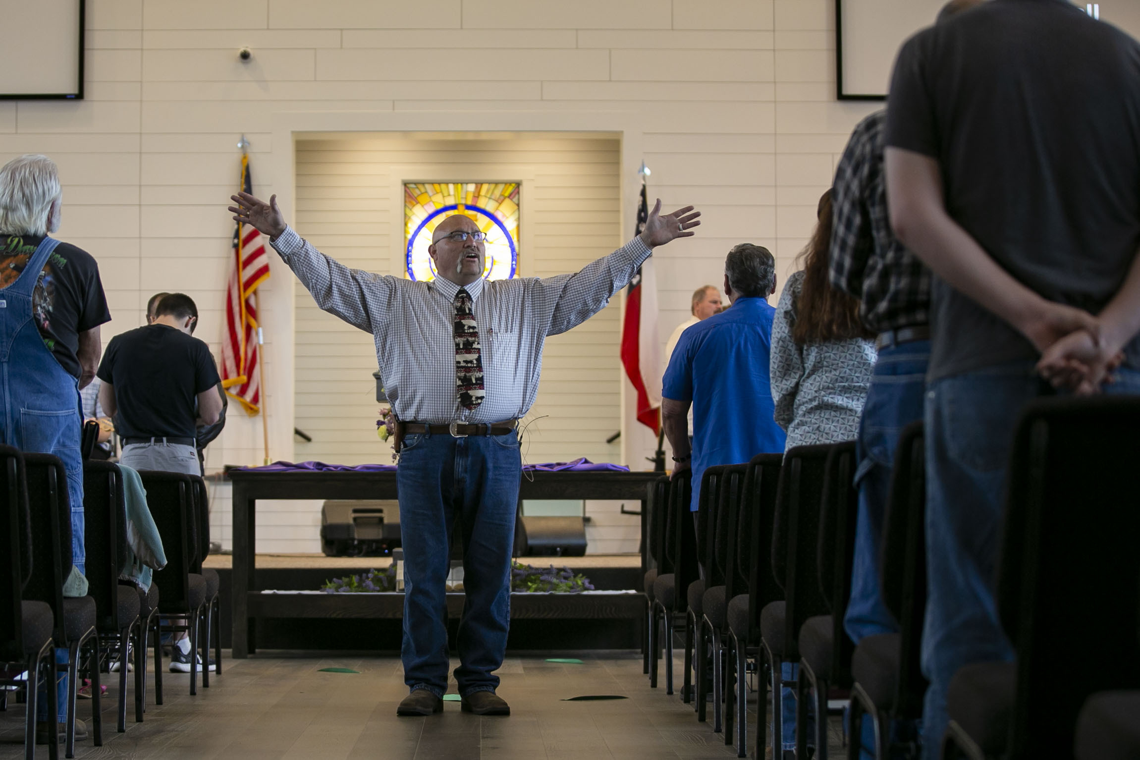 Pastor Frank Pomeroy preaches during a Sunday morning service at First Baptist Church in Sutherland Springs, Texas, on April 5, 2020. Voters in several states on Tuesday will decide whether to create new constitutional rights for people to grow food, gather in worship, vote early and visit loved ones in nursing homes.