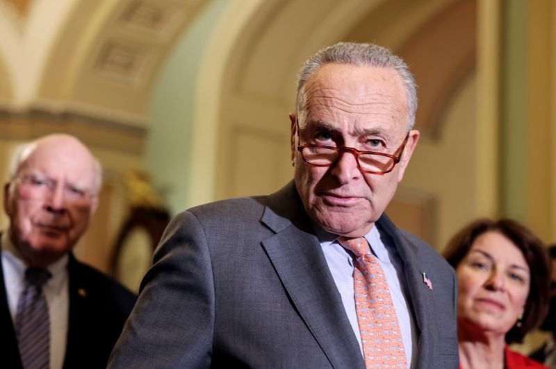 Senate Democratic Leader Chuck Schumer, D-N.Y., is flanked by U.S. Sens. Patrick Leahy, D-Vermont,) and Amy Klobuchar, D-Minn., as he faces reporters following the Senate Democrats weekly policy lunch at the Capitol in Washington, D.C., on Tuesday.