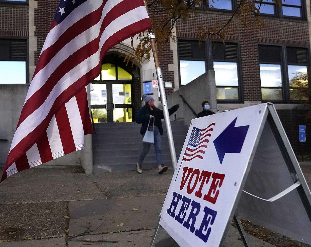 Voters emerge from Sabathani Community Center after casting their ballots during municipal elections Tuesday in Minneapolis. Voters in Minneapolis are deciding whether to replace the city’s police department with a new Department of Public Safety.