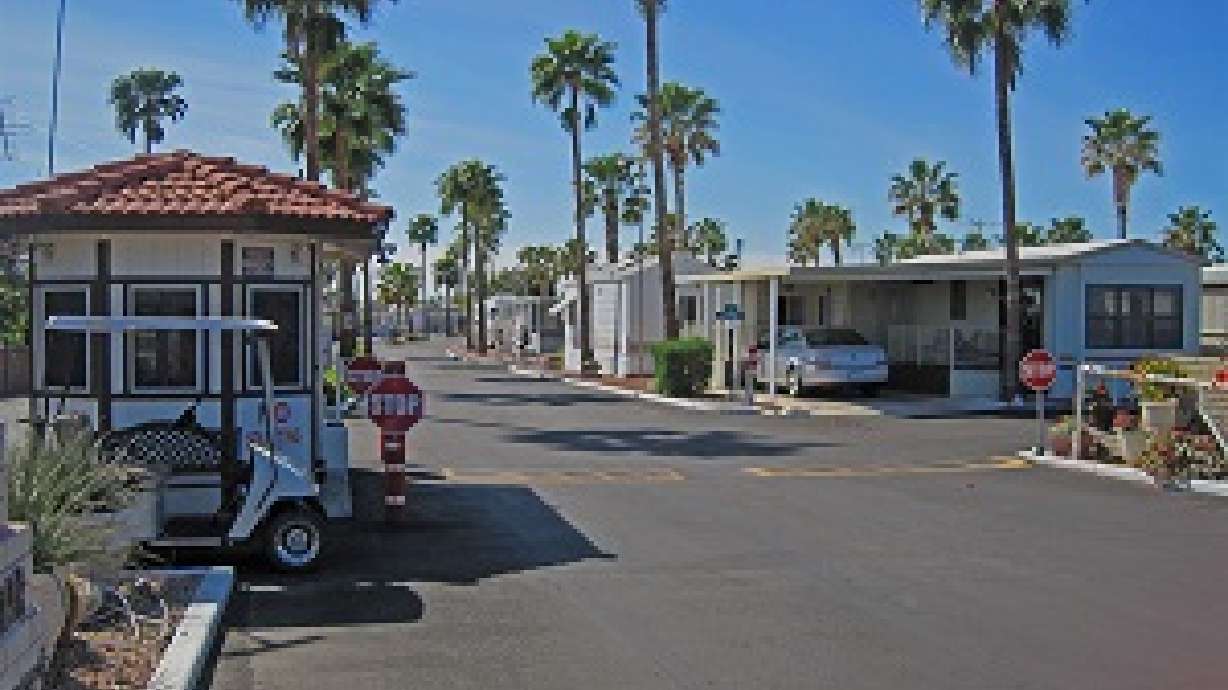Mobile home parks are not what they used to be. Now they offer tree line landscape and amenities such as pools, spas and clubhouses with weight rooms often found in high-end communities. Date and location not specified.