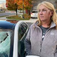 Woman left with unsettling questions after concrete chunk crashes through windshield