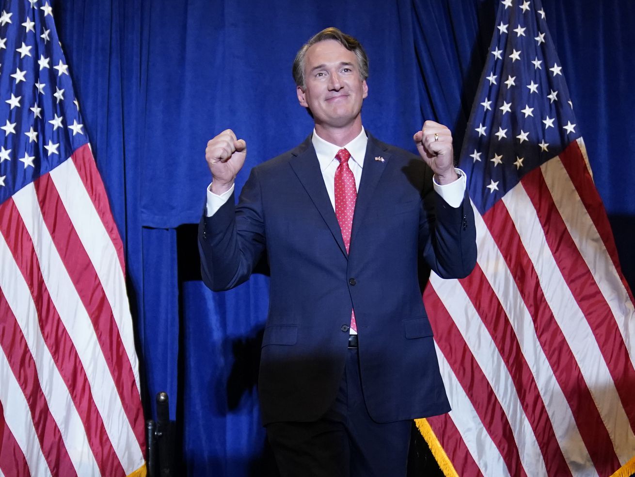 Virginia Gov.-elect Glenn Youngkin arrives to speak at an election night party in Chantilly, Va., early Wednesday, after he defeated Democrat Terry McAuliffe. While some political observers see the Republican win in the Virginia
governor’s race Tuesday as a possible blueprint for the GOP to take back the U.S. House and Senate in next year’s midterm elections, others aren’t so sure it can be duplicated.