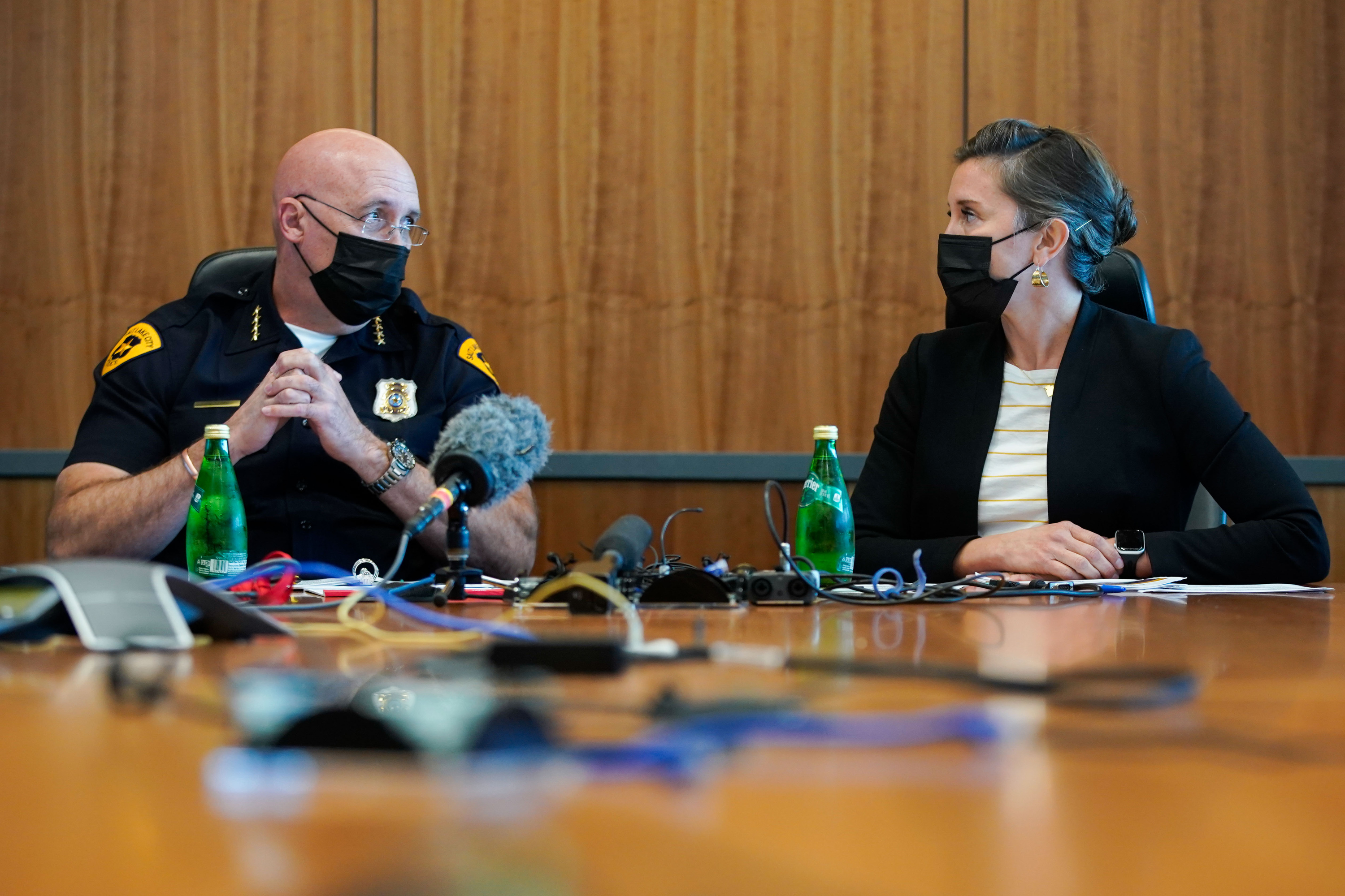 Salt Lake City Police Chief Mike Brown, left, and Salt Lake City Mayor Erin Mendenhall speak during a press conference highlighting the city’s revised crime control plan at the Salt Lake City Public Safety Building on Wednesday.
