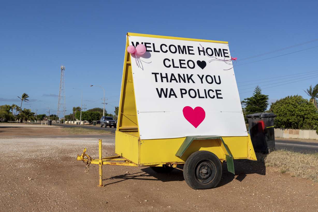 A sign, which reads, 'Welcome Home Cleo, Thank You WA Police' is seen Thursday in support of missing girl Cleo Smith who was rescued by Western Australian Police Wednesday morning in Carnarvon, Western Australia.