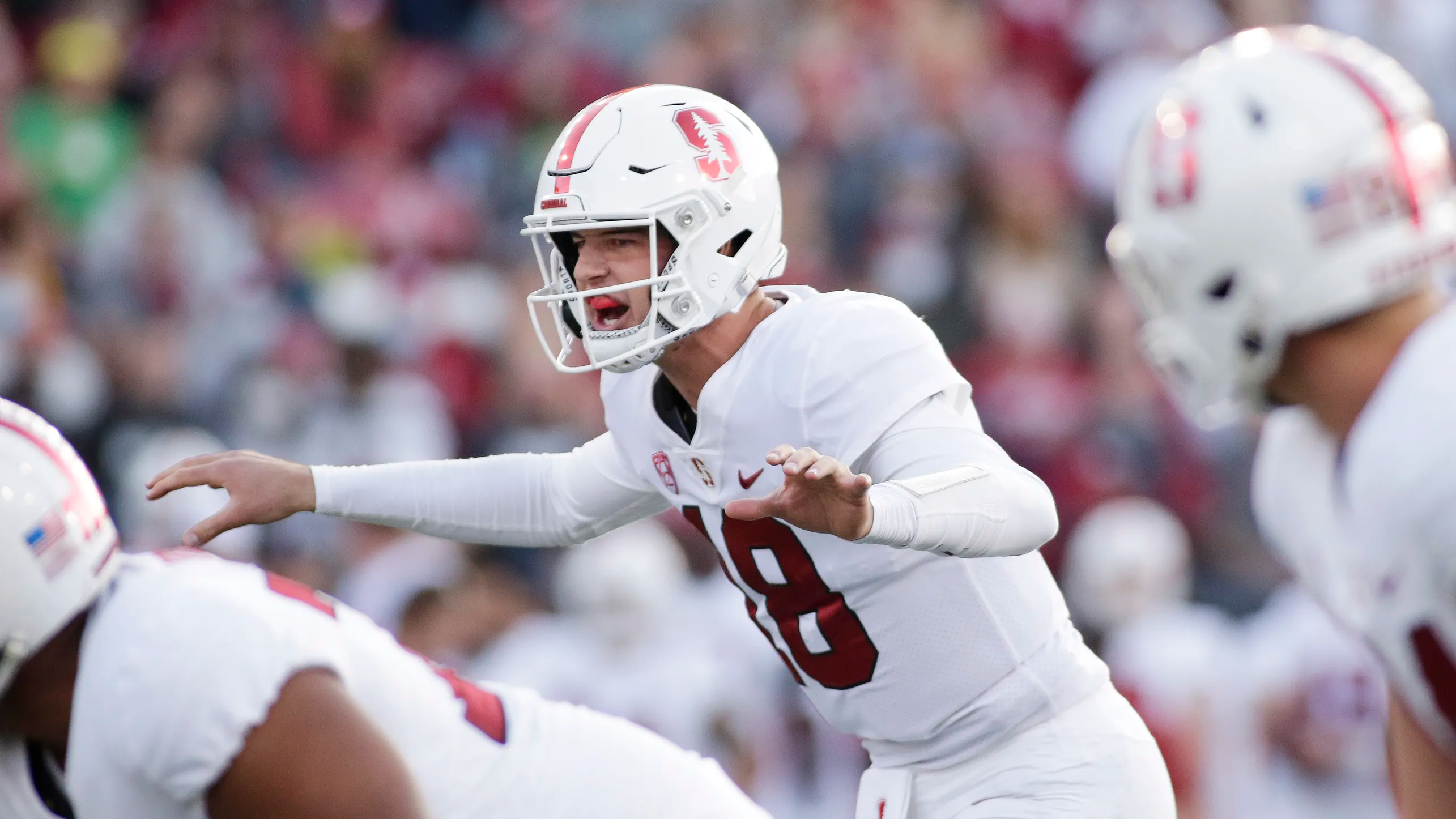 Stanford quarterback Tanner McKee, center, calls a play during game against Washington State, on Oct. 16 in Pullman, Wash. The Stanford QB is “questionable” for Friday night’s game against the Utes because of an injury. 