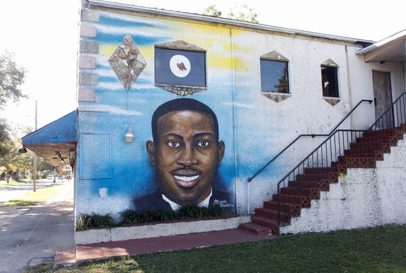 A mural of Ahmaud Arbery is painted on the side of The Brunswick African American Cultural Center in downtown Brunswick, Georgia,  Oct. 19.