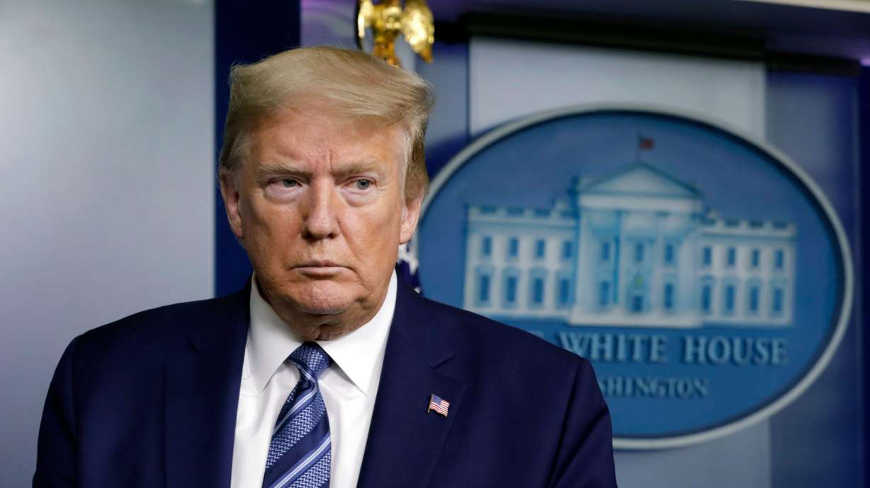United States President Donald J. Trump speaks at the White House in Washington on April 21, 2020. A Russian analyst who contributed to a dossier of Democratic-funded research into ties between Russia and Trump was indicted Thursday on charges of lying to the FBI about his sources of information