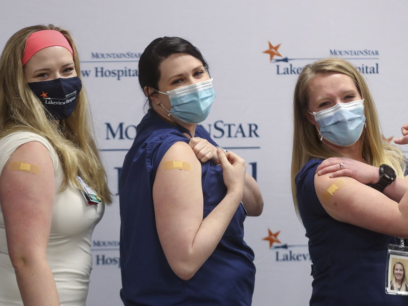 Lakeview Hospital intensive care nurses Becca Fackrell,left, Liz Barnes and Jacci Kennedy pose for photos after they received the Moderna COVID-19 vaccine at the MountainStar Healthcare hospital in Bountiful on Monday, Dec. 21, 2020. Will the Biden administration’s formalization Thursday of a COVID-19 vaccine mandate for large companies nationwide push more Utahns to get the
shots?