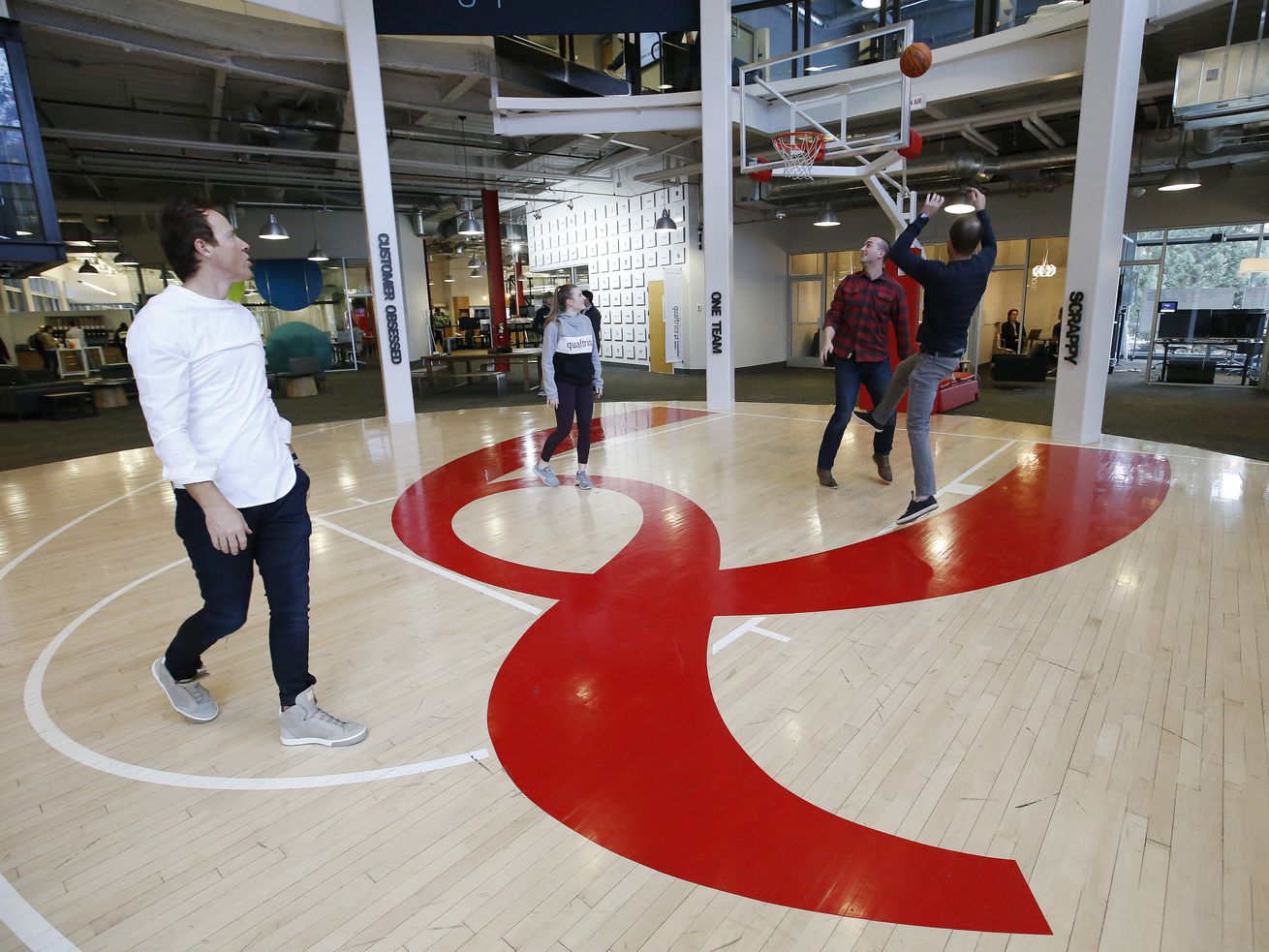 Qualtrics CEO Ryan Smith, left, plays basketball with employees at the business in Orem on Feb. 2, 2018. The much-anticipated details of President Joe Biden’s sweeping
get-vaccinated-or-get-tested mandates, announced in September, went public Thursday morning, and the clock is now ticking for larger businesses in Utah and across the country to comply with the new rules or face stiff fines.