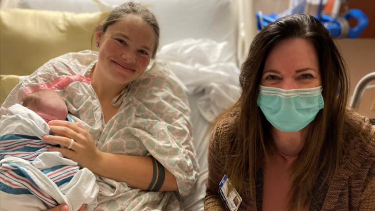 Former emergency room nurse Tami Timothy and mother Shelby with newborn baby Olivia.