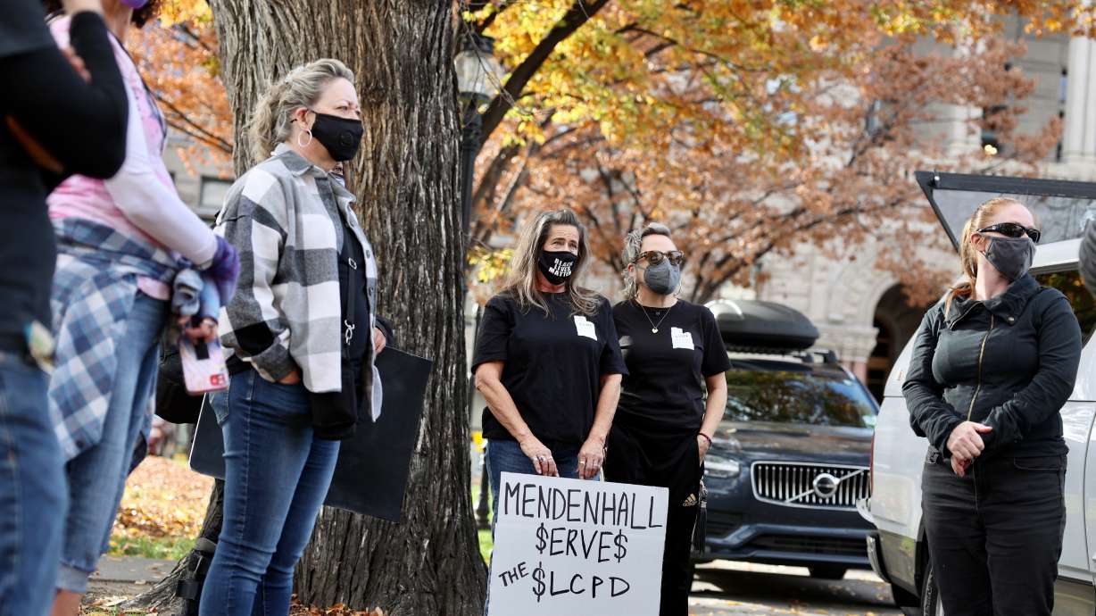 Black Lives Matter Utah protesters stand outside the Salt Lake City-County Building on Thursday.