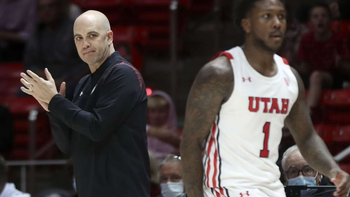 Utah Utes basketball coach Craig Smith claps during the game against Westminster at the Huntsman Center in Salt Lake City on Thursday, Nov. 4, 2021.