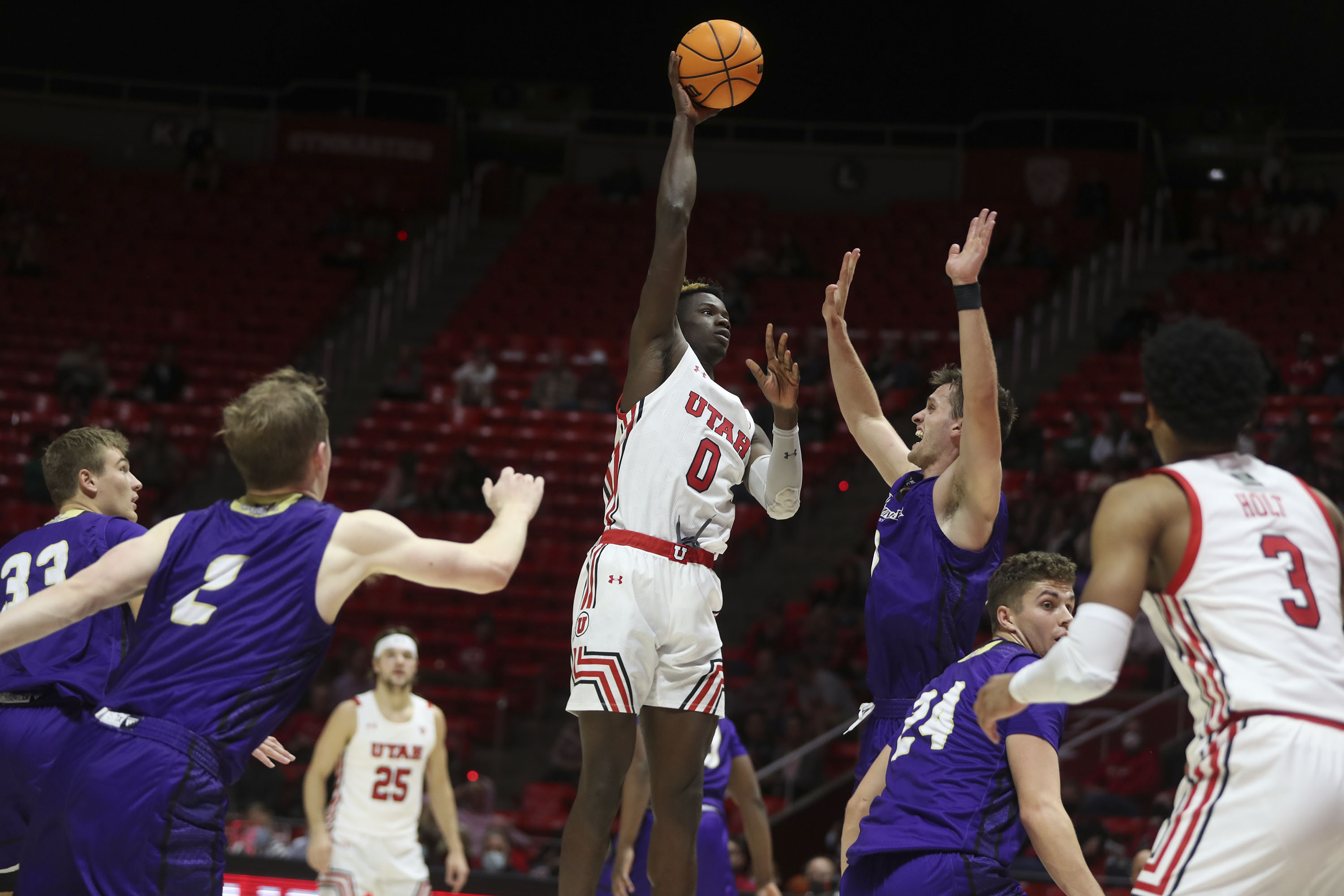 Utah Utes center Lahat Thioune (0) shoots against Westminster at the Huntsman Center in Salt Lake City on Thursday, Nov. 4, 2021.