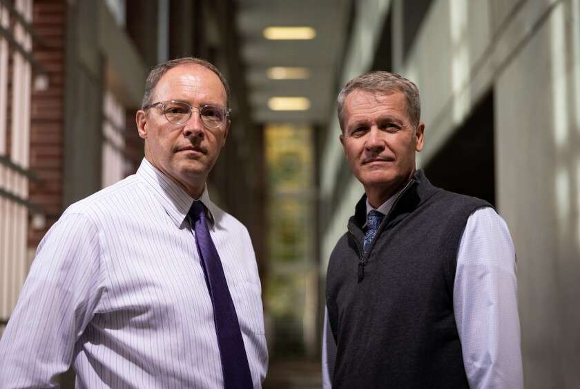 BYU professors Michael Barnes (left) and Carl Hanson were two researchers on the project that analyzed over a billion data points to develop an algorithm that can predicts suicidal thoughts and behaviors with 91% accuracy.