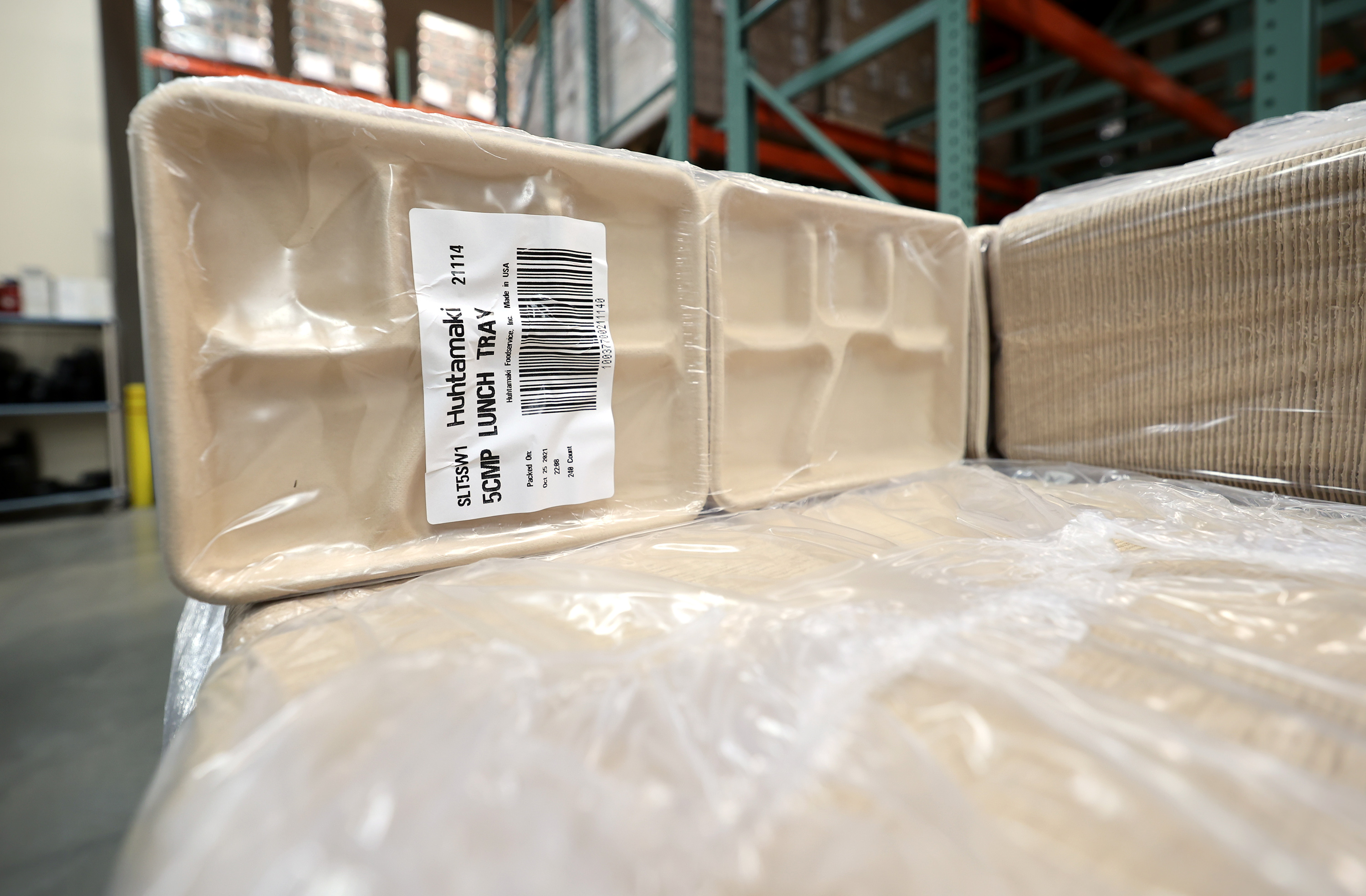 Disposable food trays, which were ordered in June and just arrived, wait to be delivered to schools from Bates Central Kitchen, the Granite School District's central kitchen and warehouse, in West Valley City on Friday.