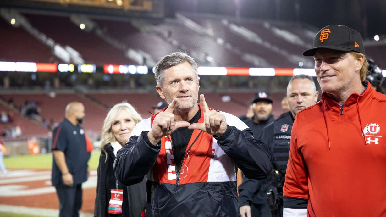 Utah Utes head coach Kyle Whittingham flashes the “U” at fans after the game against the Stanford Cardinal in Stanford, Calif. on Friday, Nov. 5, 2021.