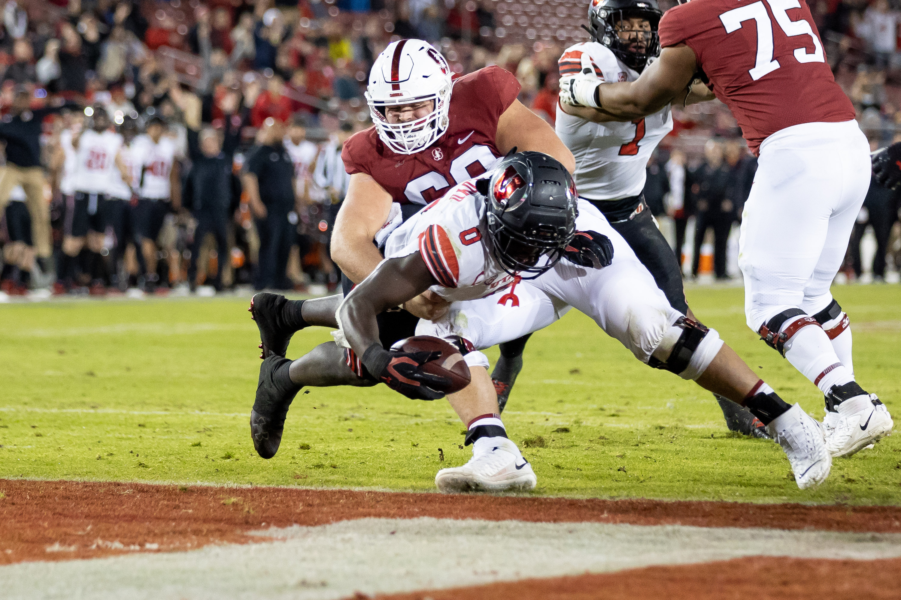 Utah Utes linebacker Devin Lloyd (0) gets past Stanford Cardinal center Drake Nugent (60) to score after Lloyd intercepted a pass from Stanford Cardinal quarterback Jack West (10) in Stanford, Calif. on Friday, Nov. 5, 2021.