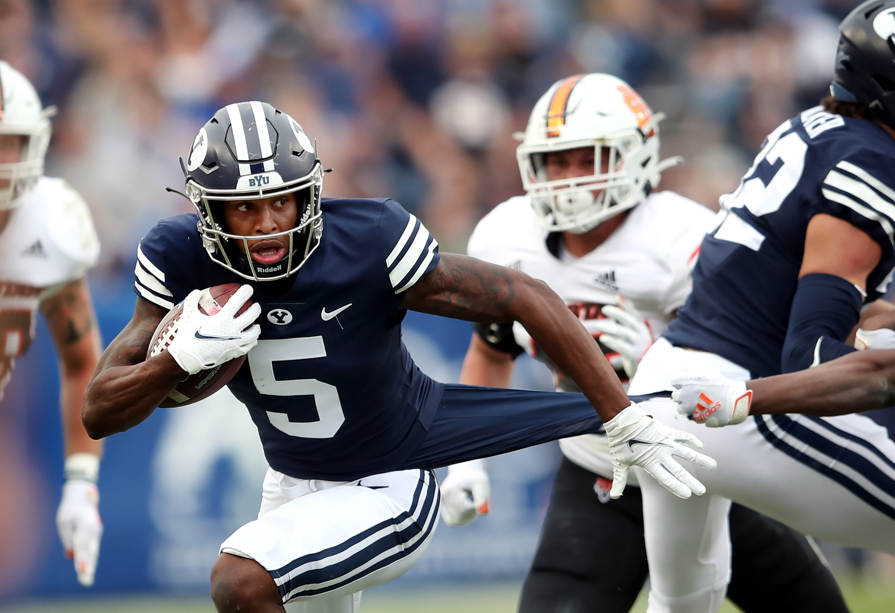 Brigham Young Cougars wide receiver Chris Jackson (5) fights to get free on a run as the BYU Cougars and Idaho State Bengals play at LaVell Edwards Stadium in Provo on Saturday, Nov. 6, 2021.