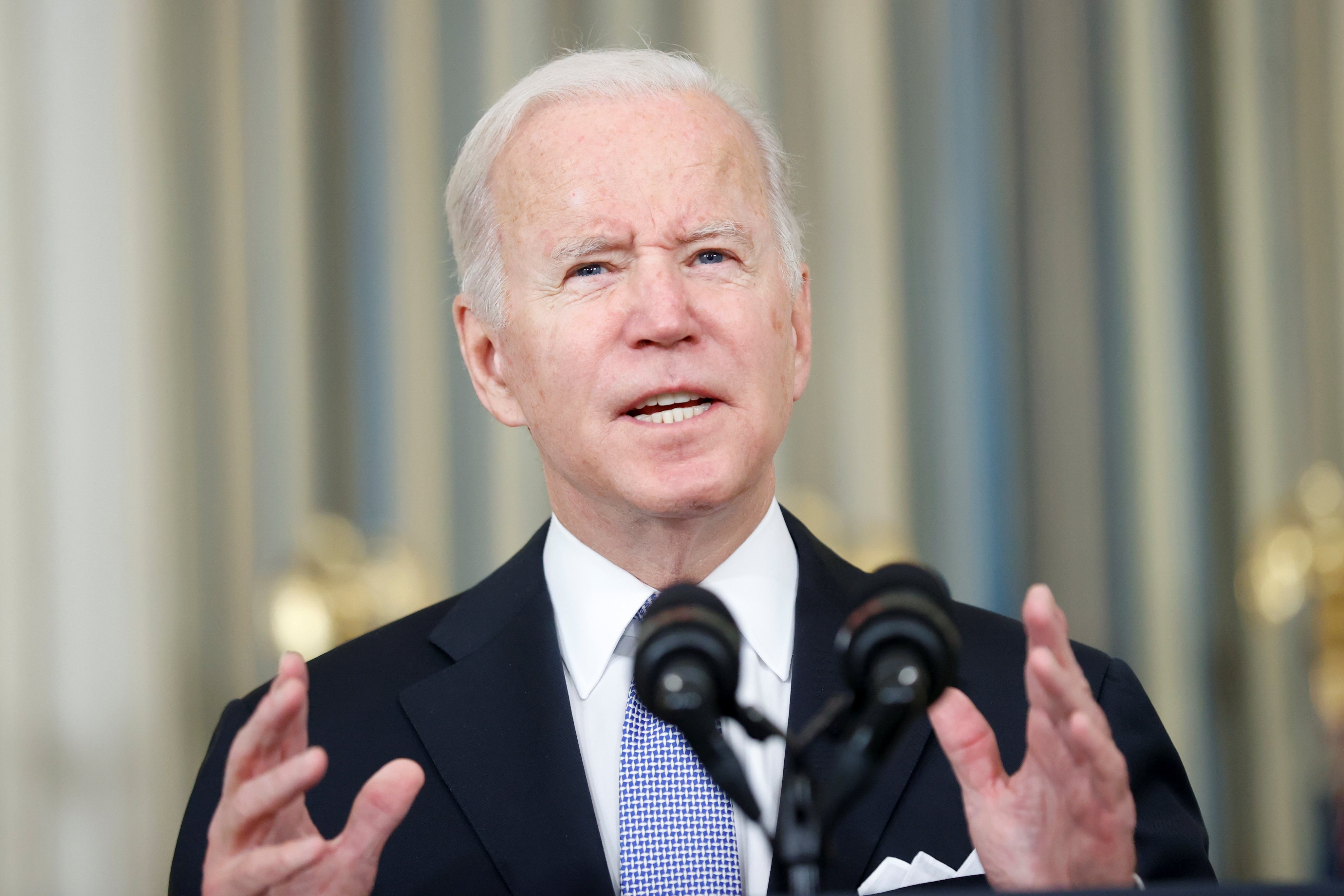 President Joe Biden delivers remarks after late-night passage of a $1 trillion infrastructure bill to repair the nation's airports, roads and bridges, at the White House in Washington, D.C. on Saturday. Biden is getting ready to deliver on a key campaign promise by convening a Summit for Democracy: a first-of-its-kind gathering of more than 100 countries to help stop democratic backsliding and erosion of rights and freedoms worldwide.