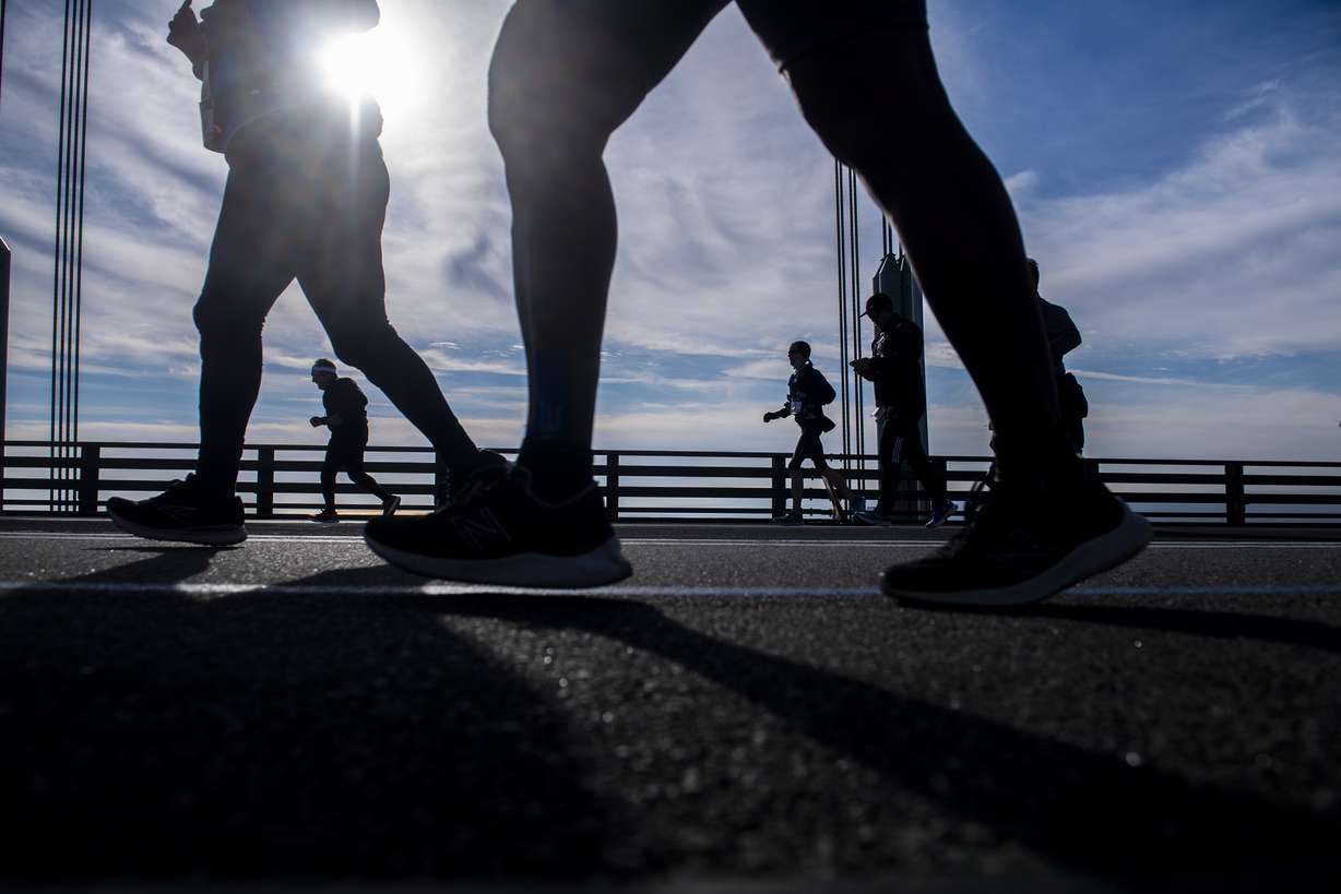 Runners make their way at the start of the New York City Marathon on Nov. 7, 2021. A volunteer who has been with the marathon since the start called the beginning of the race the most exciting part.