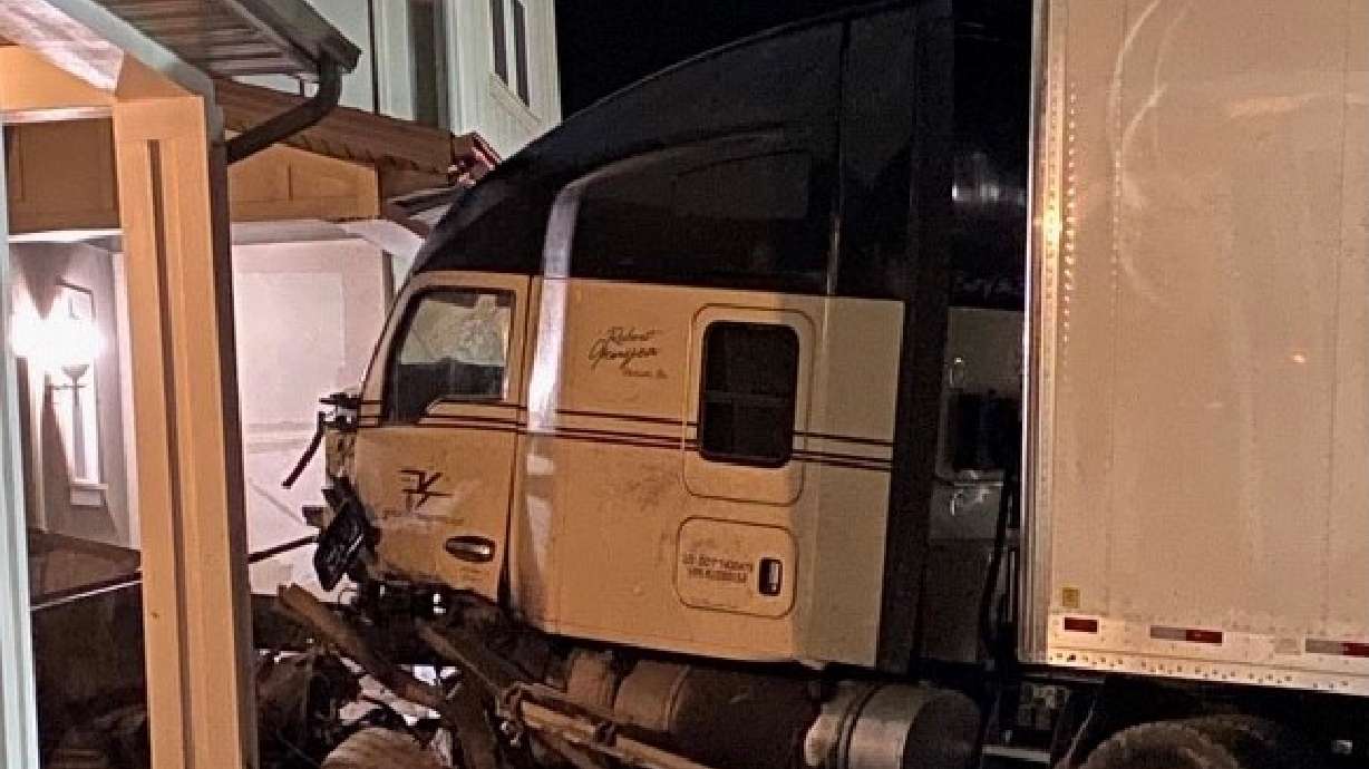 A semi crashed in a Lindon property early Sunday morning.