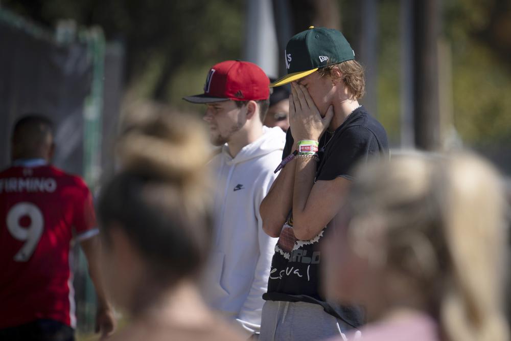 A man cries at a memorial for the victims of the Astroworld music festival in Houston on Sunday.