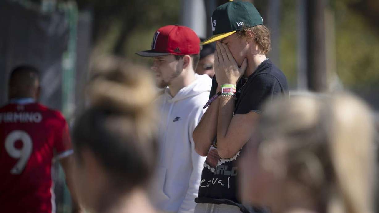 A man cries at a memorial for the victims of the Astroworld music festival in Houston on Sunday.