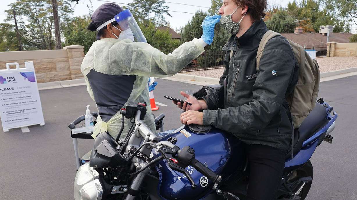 Matthew James is tested for COVID-19 in Cottonwood
Heights on Sept. 30. A bill intended to ensure Utahns who’ve previously had COVID-19 can claim natural immunity against the virus to avoid being required by their employers to get vaccinated or submit to weekly testing is on the agenda for the special session of the Utah Legislature that starts Tuesday.